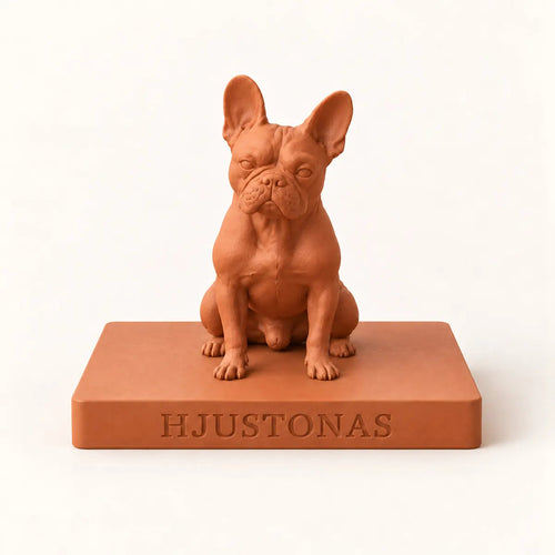 The dog's name recessed on the front of the base