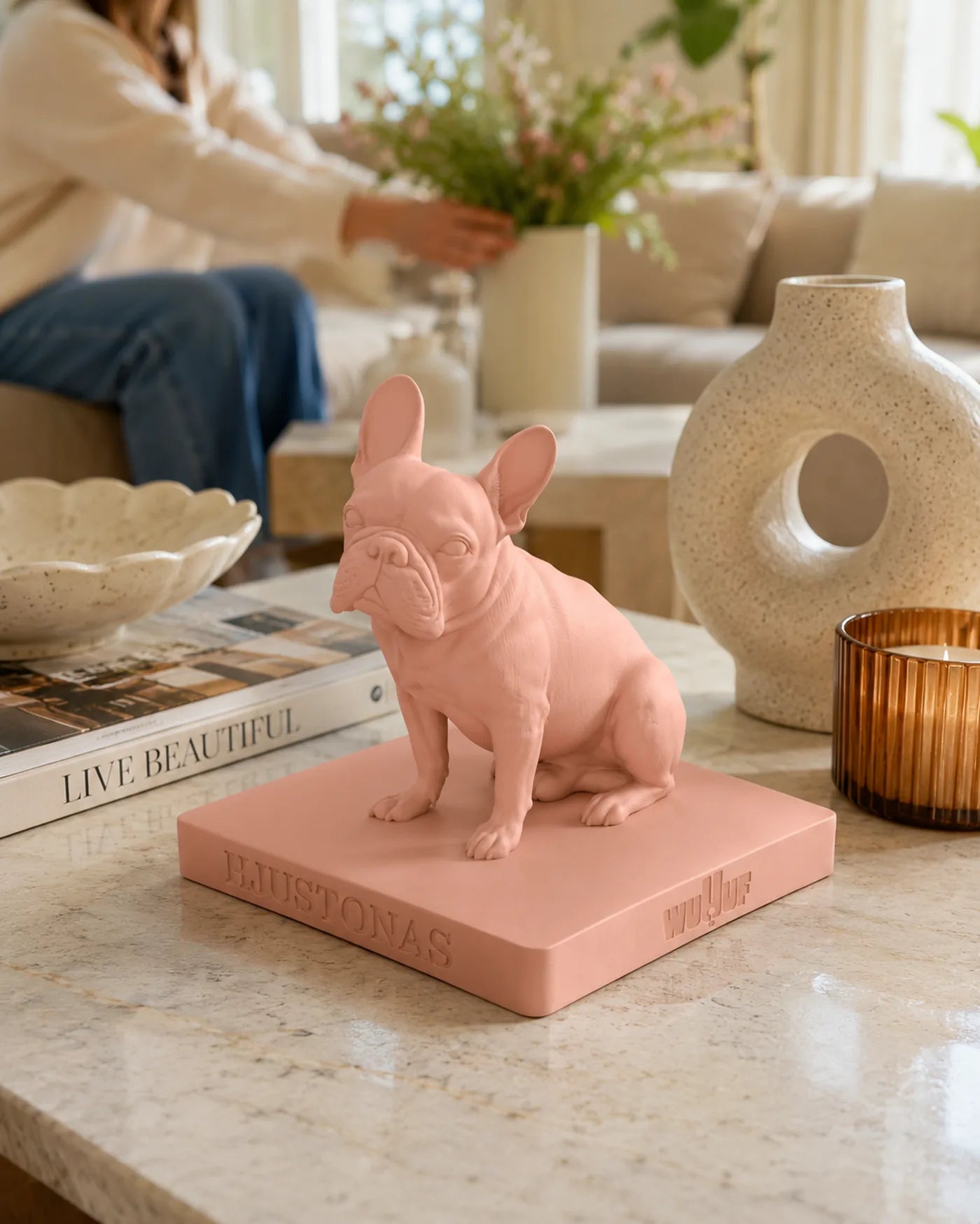 A Blush WUUUF sculpture on a kitchen counter, ready to be given